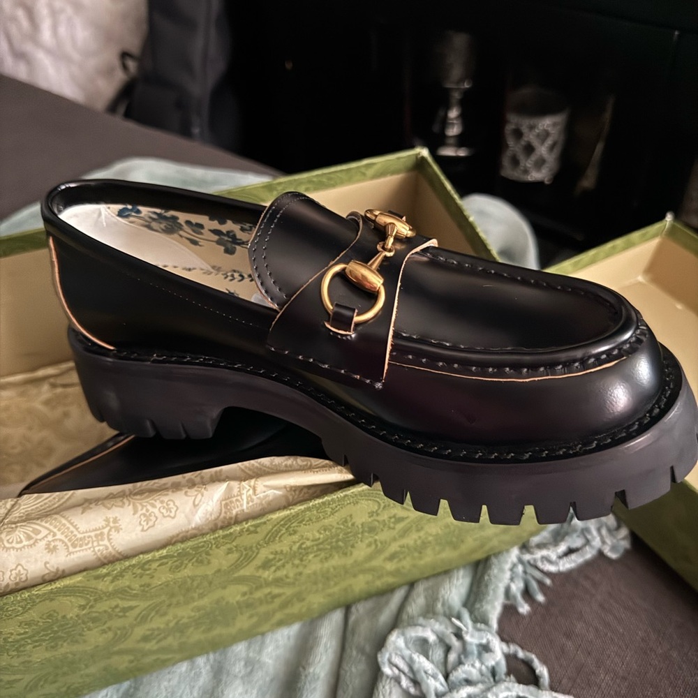 Gucci Black Leather Loafers with Gold Accent